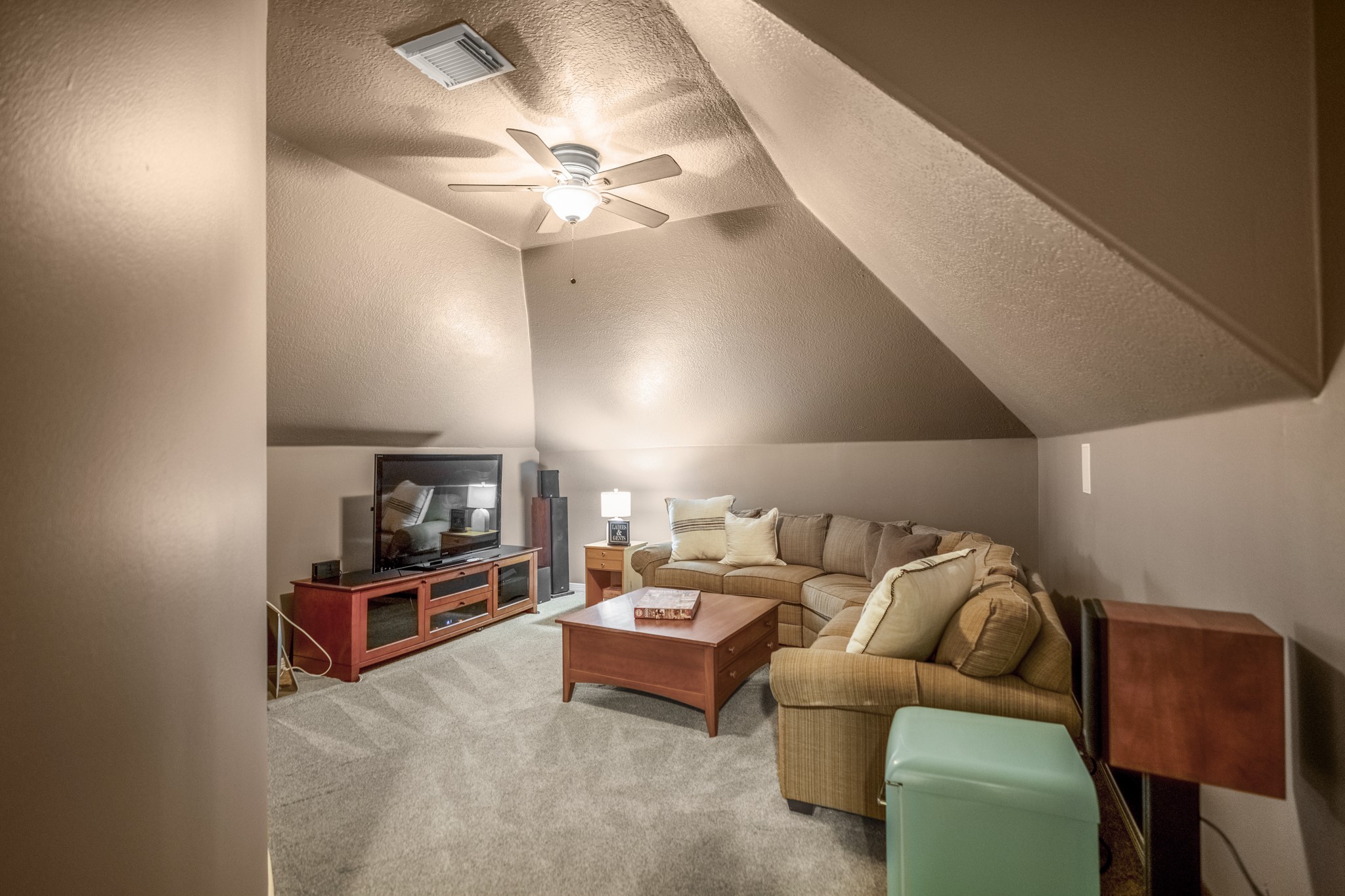 8806 Sterling Gate Circle Spring, TX 77379 - Photo 26 of 40 The cozy media room offers a wonderful place for families and friends to enjoy movie night. No need for darkening curtains!