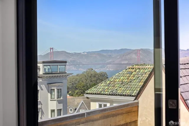 a view of balcony with furniture