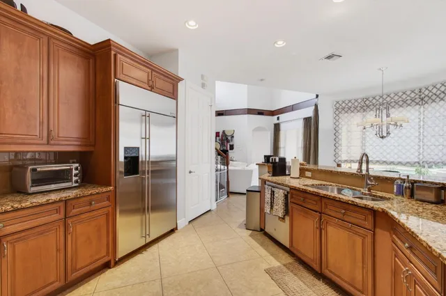 a view of a yard with palm trees