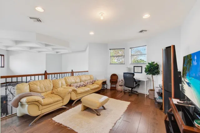 a view of a swimming pool with a yard