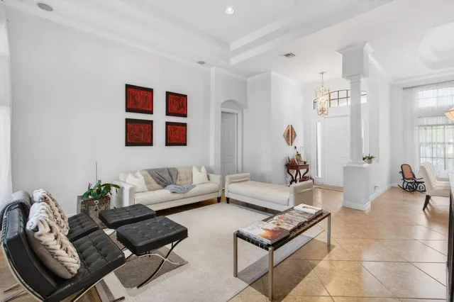a bathroom with a sink a toilet and shower curtain