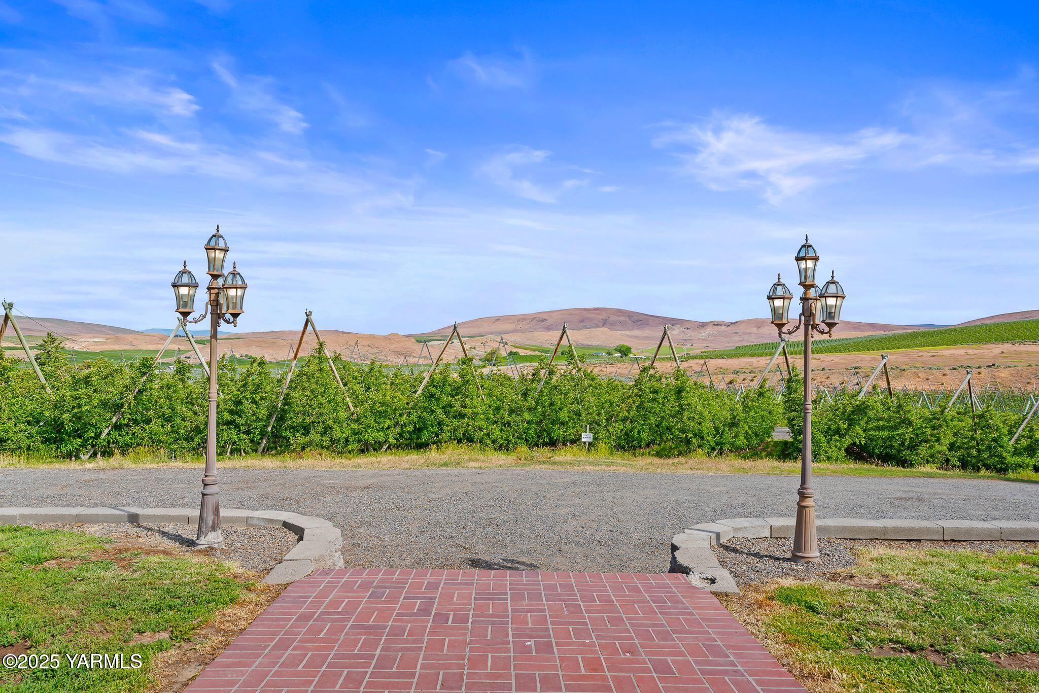 3090 Lombard Loop Road Wapato, WA 98951 - Photo 6 of 44 a view of a street with a building in the background