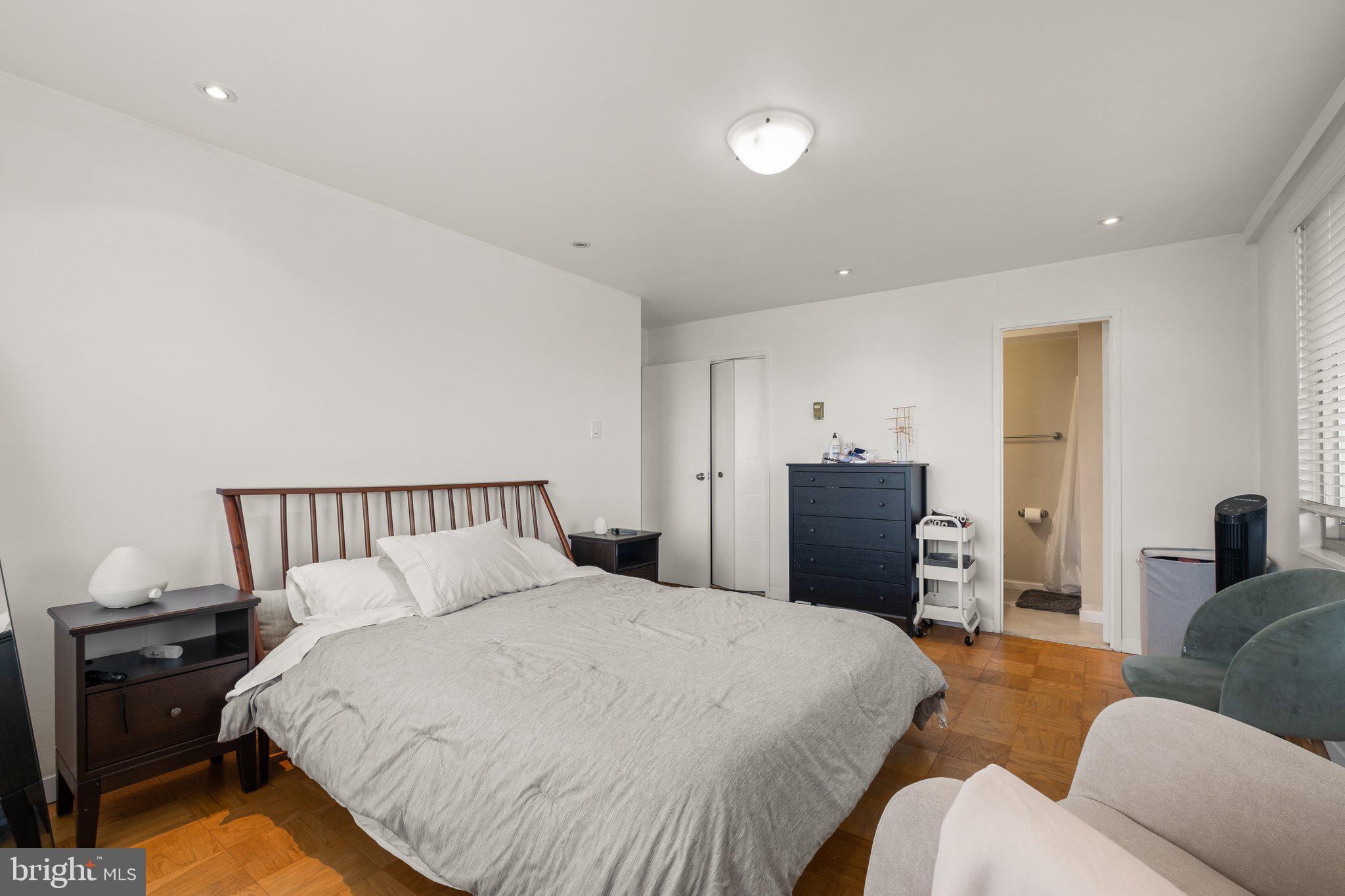 1900 Lyttonsville Road, Unit 1016 Silver Spring, MD 20910 - Photo 22 of 30 a bedroom with a bed and furniture