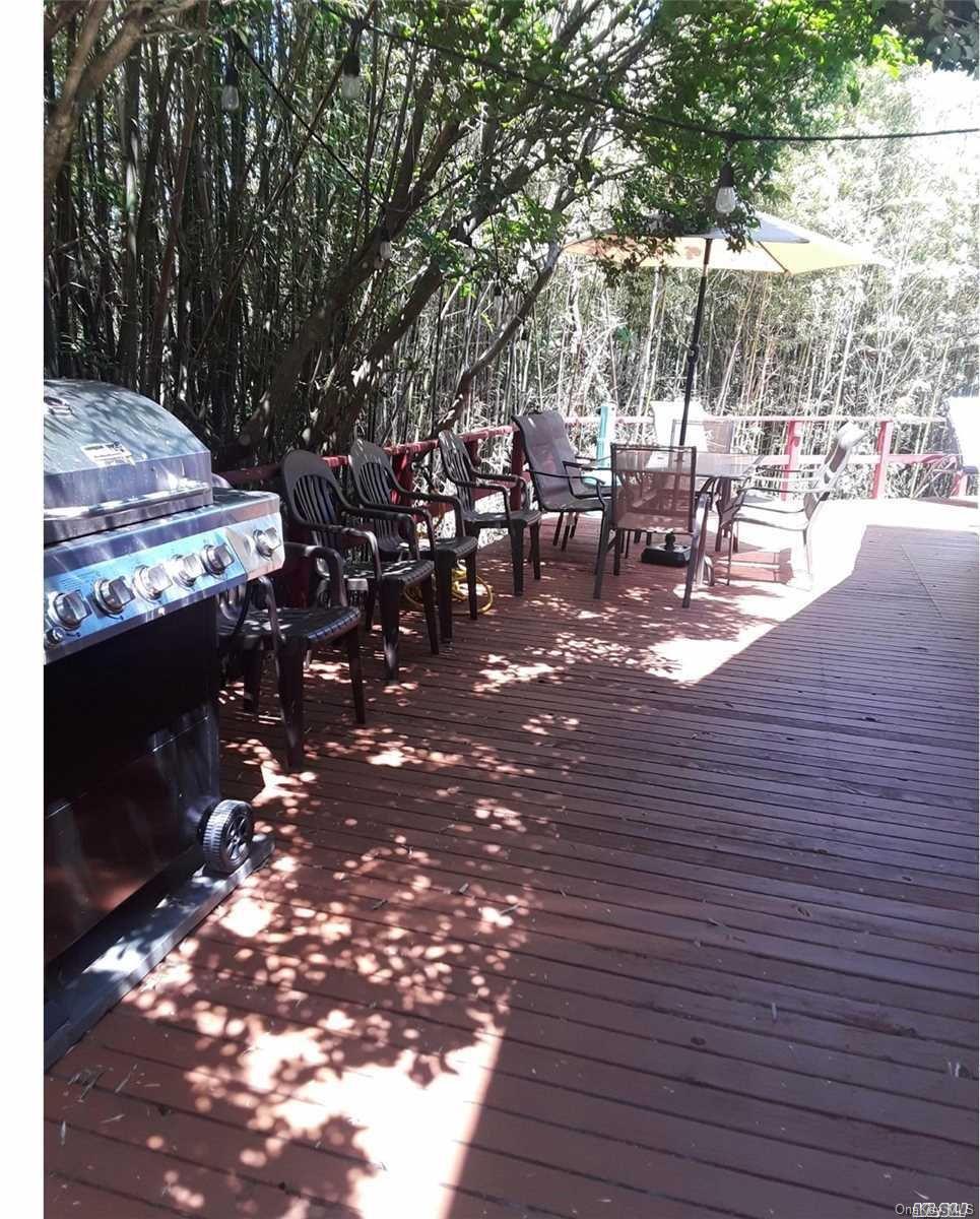 49 Surf Ocean Beach, NY 11770 - Photo 11 of 12 a view of outdoor space with seating area