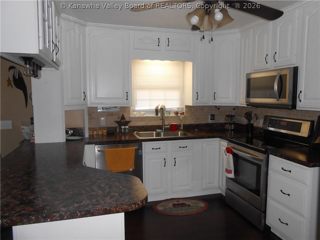 317 Round Knob Road Red House, WV 25168 - Photo 13 of 27 Kitchen with new stainless LG appliances and smart refrigerator