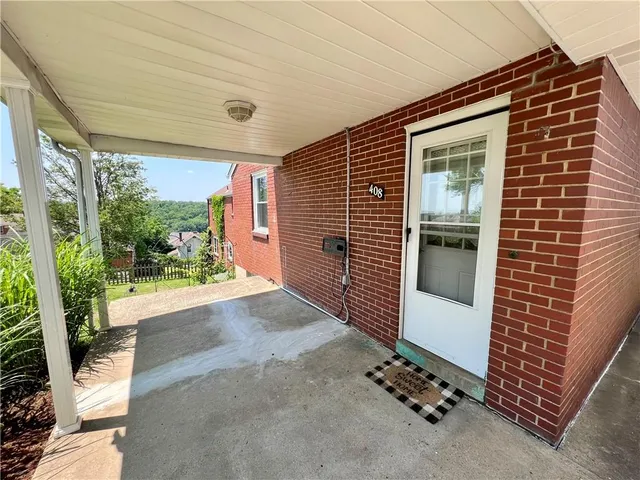 a kitchen with a stove and a sink