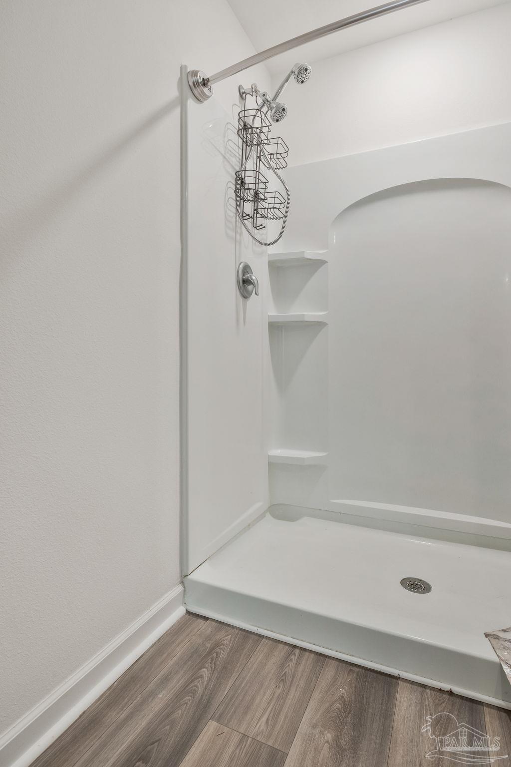 1625 Addies Way Pensacola, FL 32534 - Photo 30 of 50 a view of walk in closet with empty racks