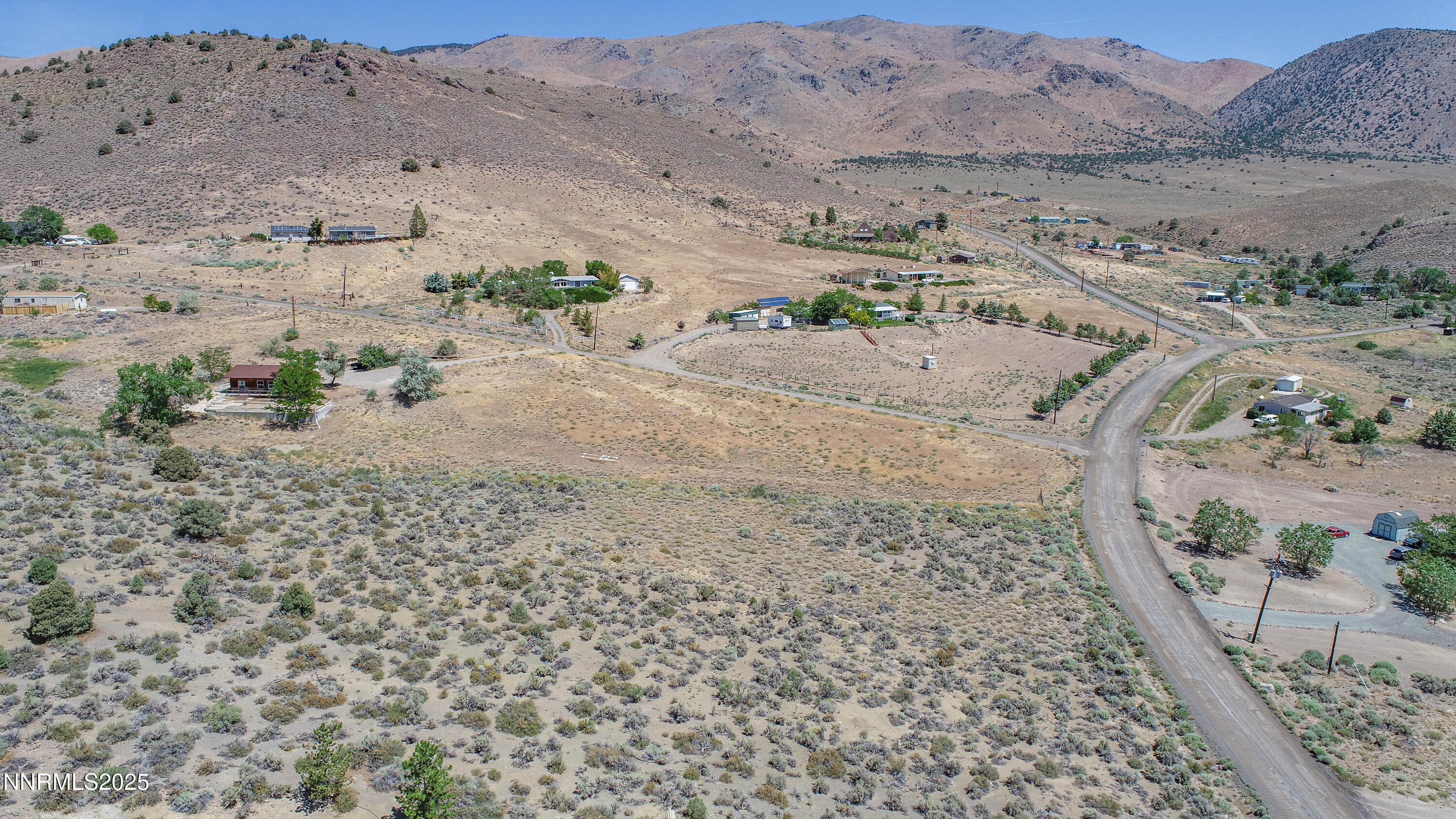 3955 Mica Court Topaz Ranch Estates, NV 89444 - Photo 13 of 26 an aerial view of beach and mountain