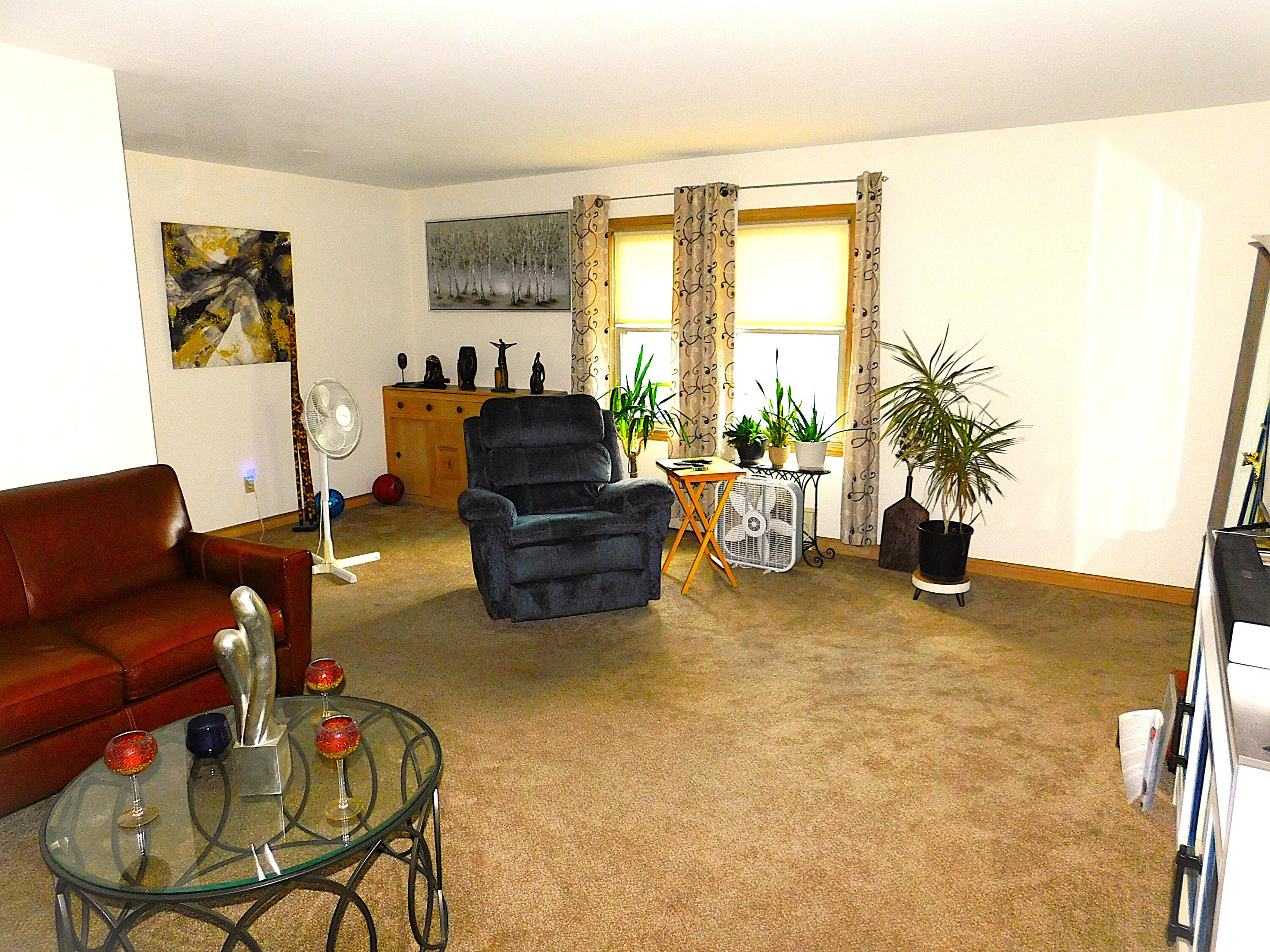 3350 North 60th Street, Unit 3352 Milwaukee, WI 53216 - Photo 18 of 26 Living room up 2