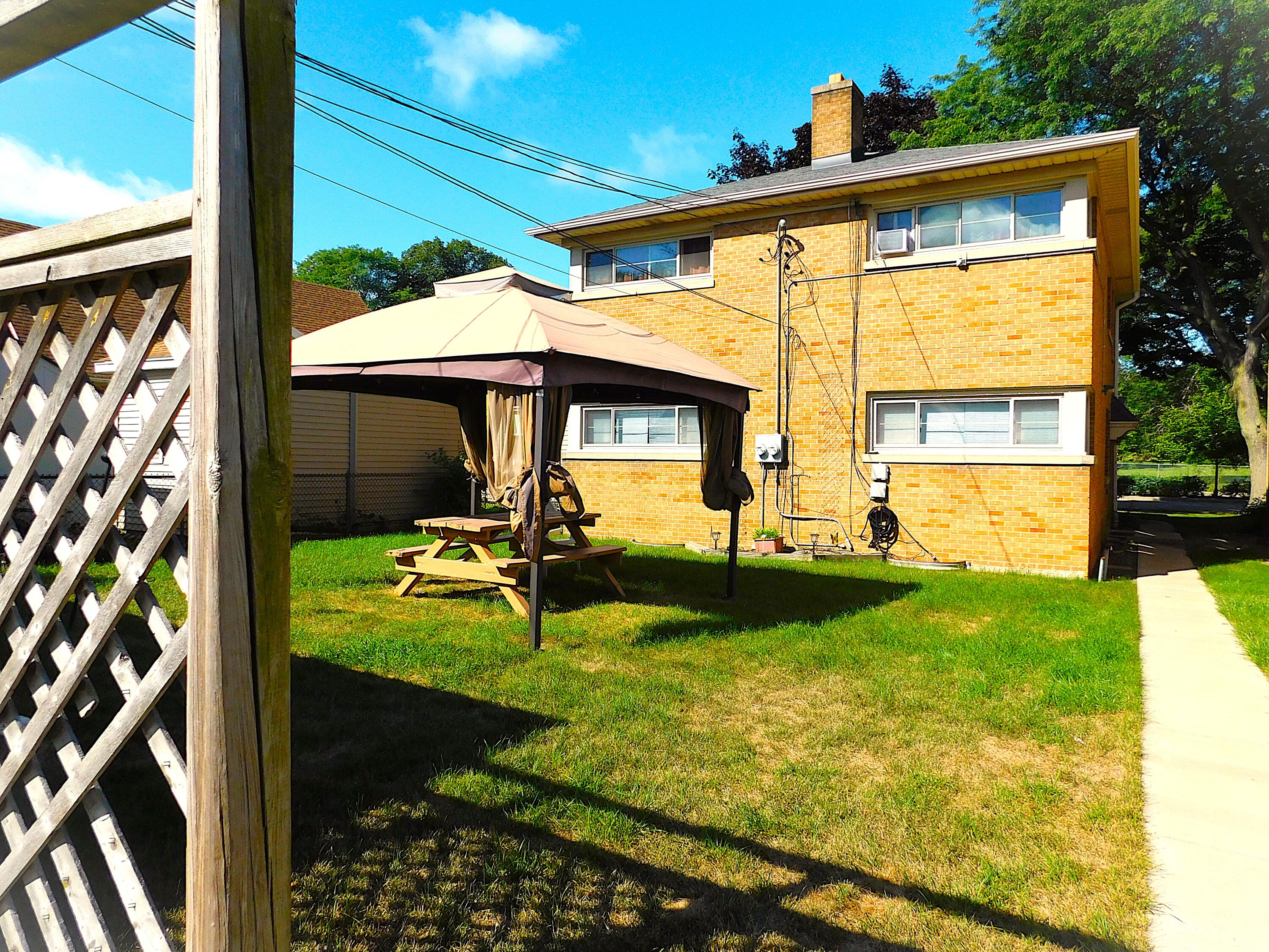 3350 North 60th Street, Unit 3352 Milwaukee, WI 53216 - Photo 3 of 26 Duplex from east garage
