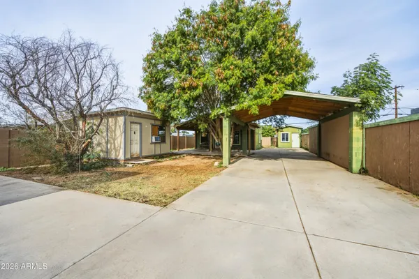 a house with trees in front of it