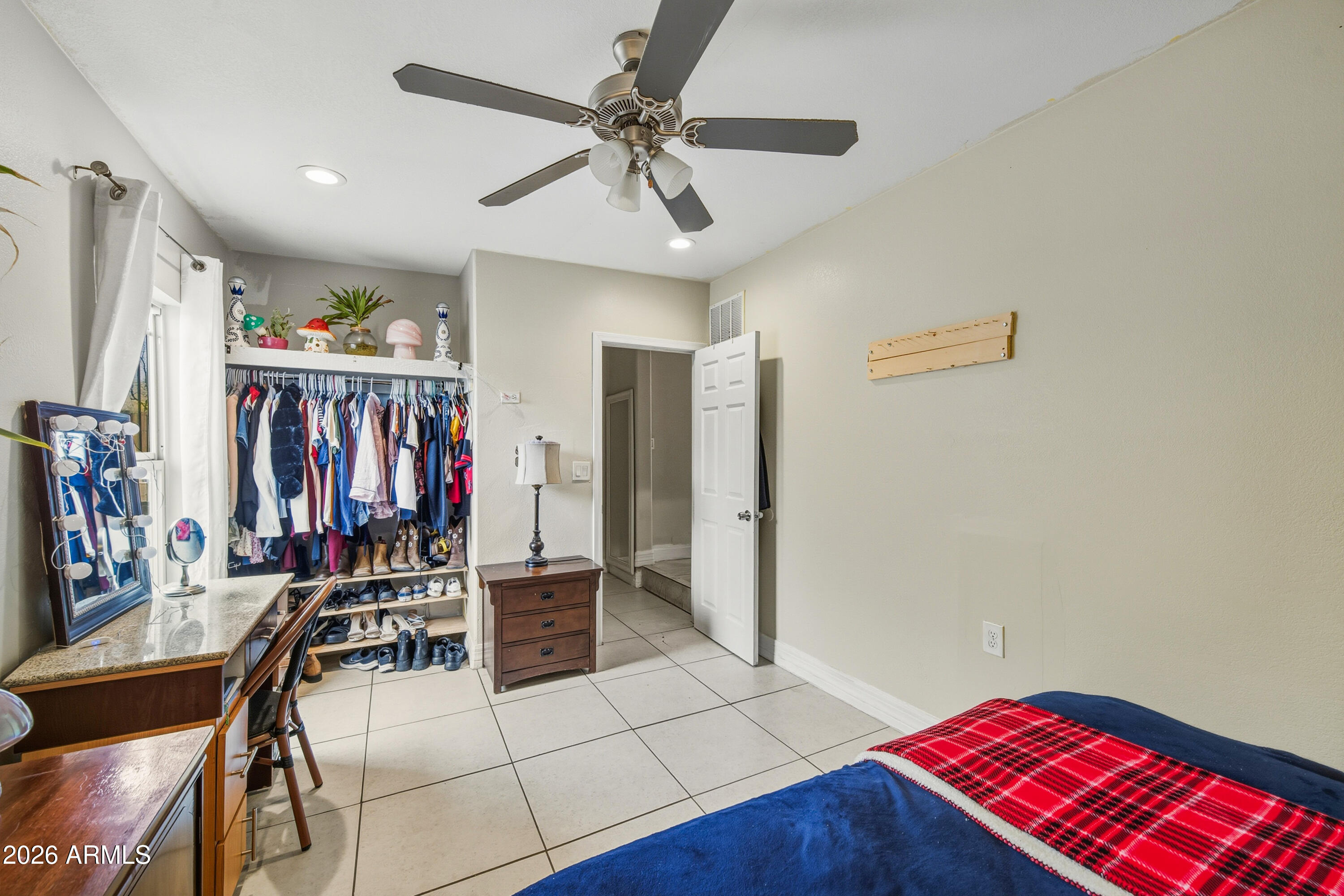 2726 West Taylor Street Phoenix, AZ 85009 - Photo 12 of 17 a view of a room with gym equipment