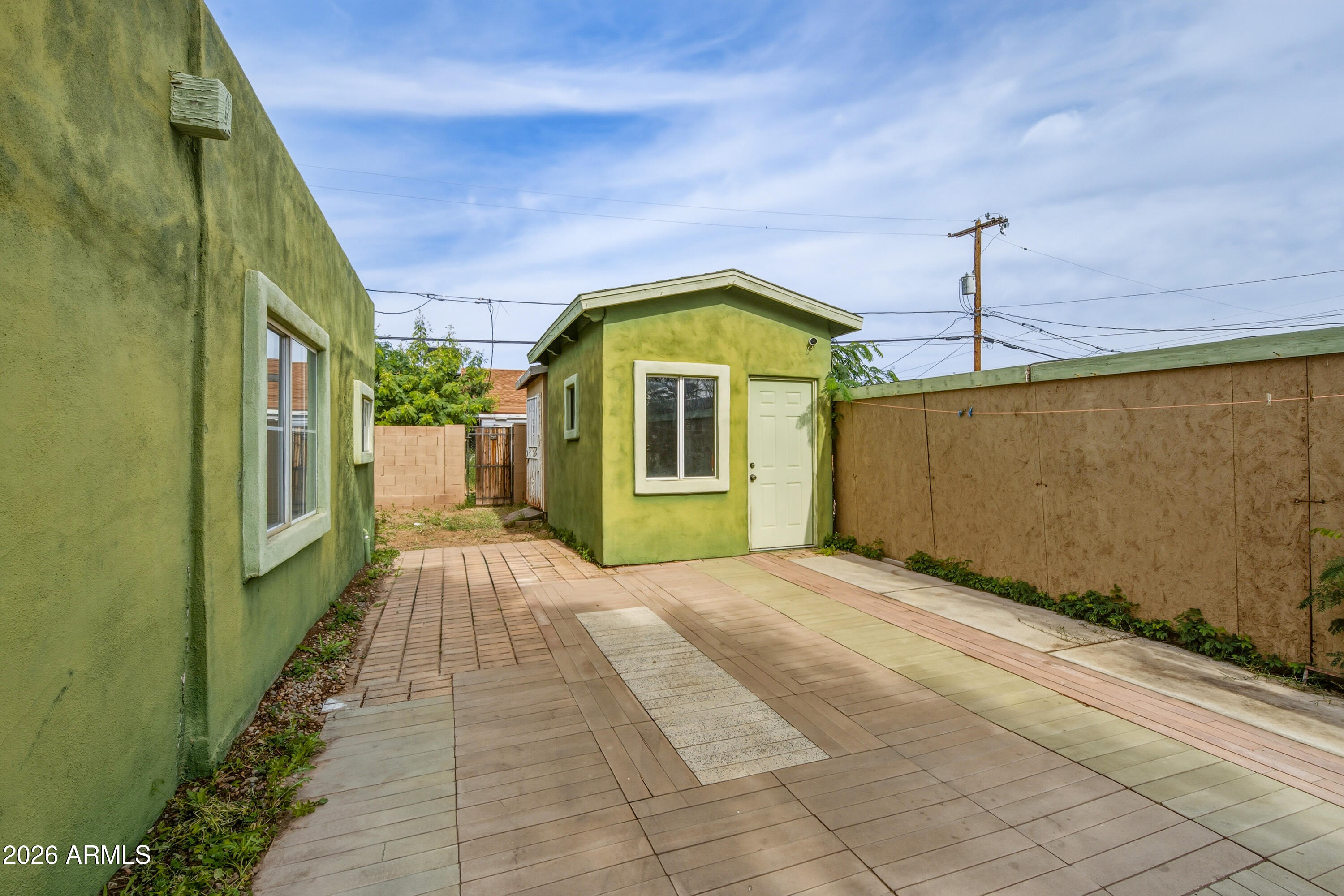 2726 West Taylor Street Phoenix, AZ 85009 - Photo 15 of 17 a view of a back yard of the house