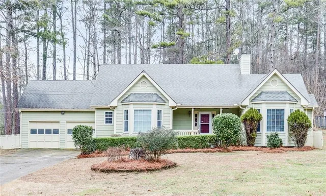 front view of a house with a yard