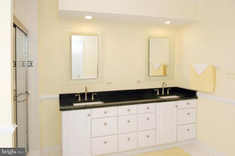 3731 North Glebe Road Arlington, VA 22207 - Photo 19 of 27 a bathroom with a sink and a mirror