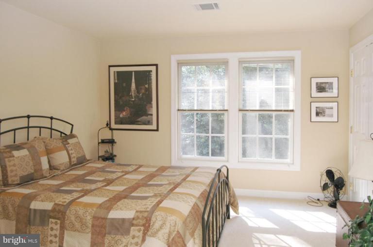 3731 North Glebe Road Arlington, VA 22207 - Photo 21 of 27 a bedroom with a bed and a window