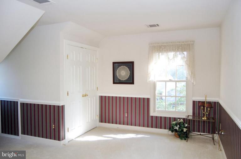 3731 North Glebe Road Arlington, VA 22207 - Photo 22 of 27 a living room with furniture and a window