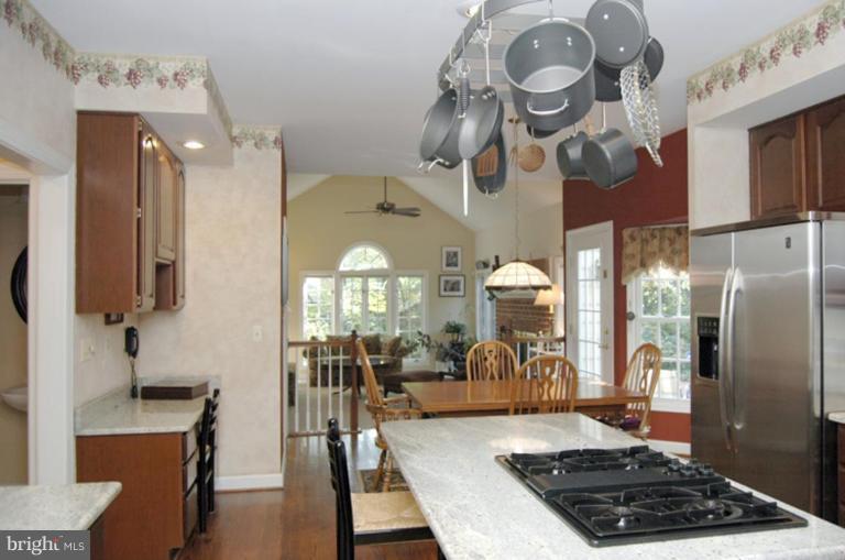 3731 North Glebe Road Arlington, VA 22207 - Photo 9 of 27 a kitchen with a table and chairs in it