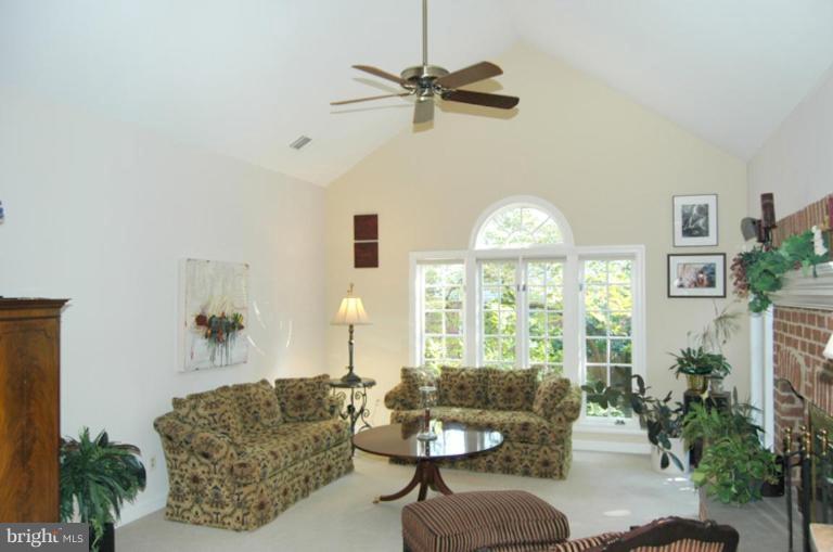 3731 North Glebe Road Arlington, VA 22207 - Photo 10 of 27 a living room with furniture and a large window
