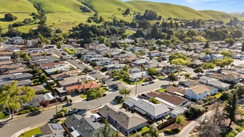an aerial view of a city with lots of residential buildings