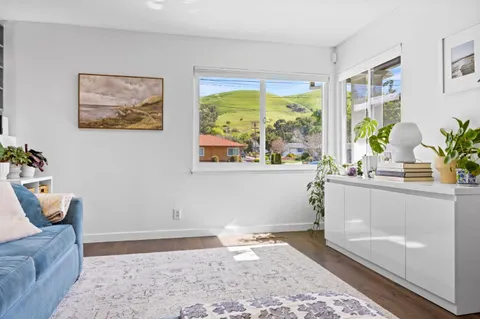 a living room with a large window