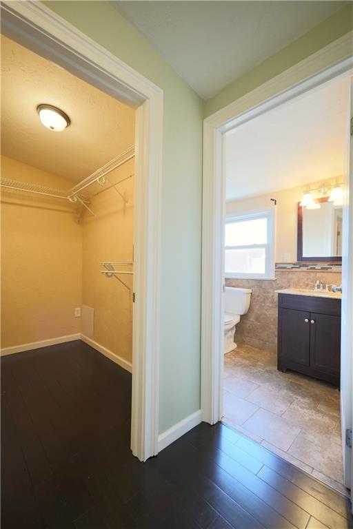 513 Lockhart Street, Unit 2 Pittsburgh, PA 15212 - Photo 14 of 21 a view of a room with wooden floor and cabinet