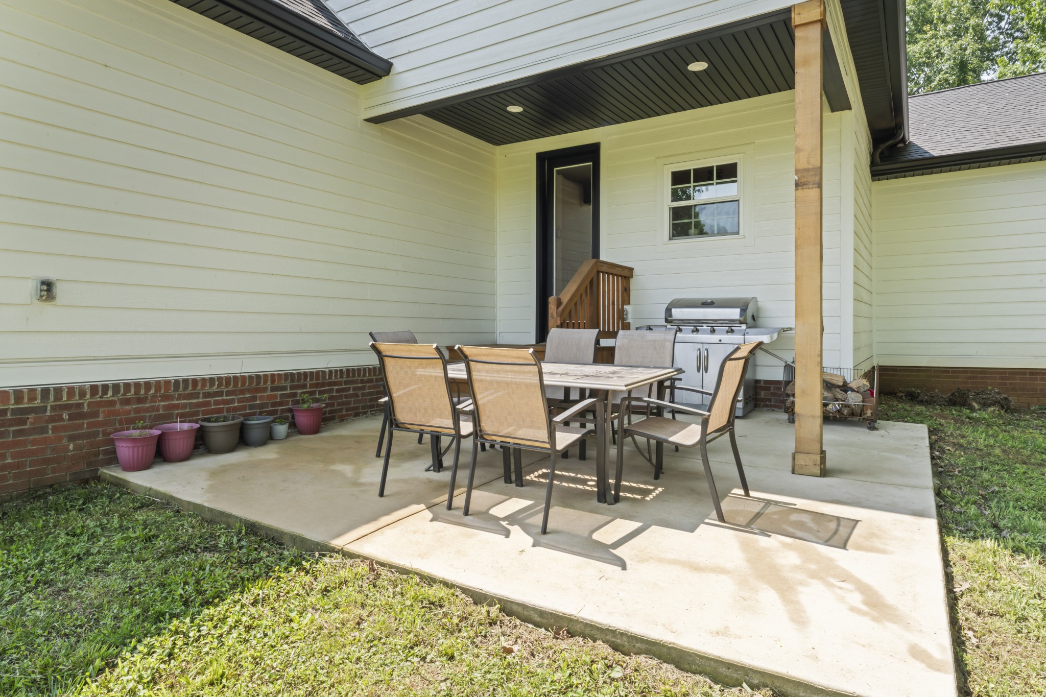 1510 Wade Brown Road Lewisburg, TN 37091 - Photo 11 of 59 a view of a patio with table and chairs and potted plants