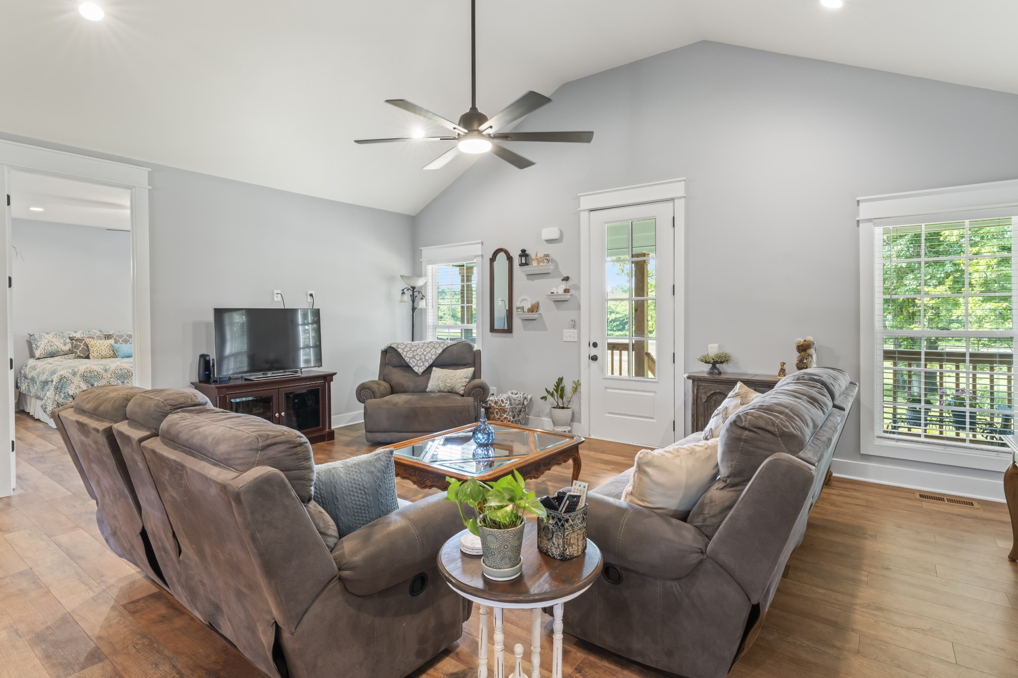 1510 Wade Brown Road Lewisburg, TN 37091 - Photo 21 of 59 a living room with furniture and a flat screen tv