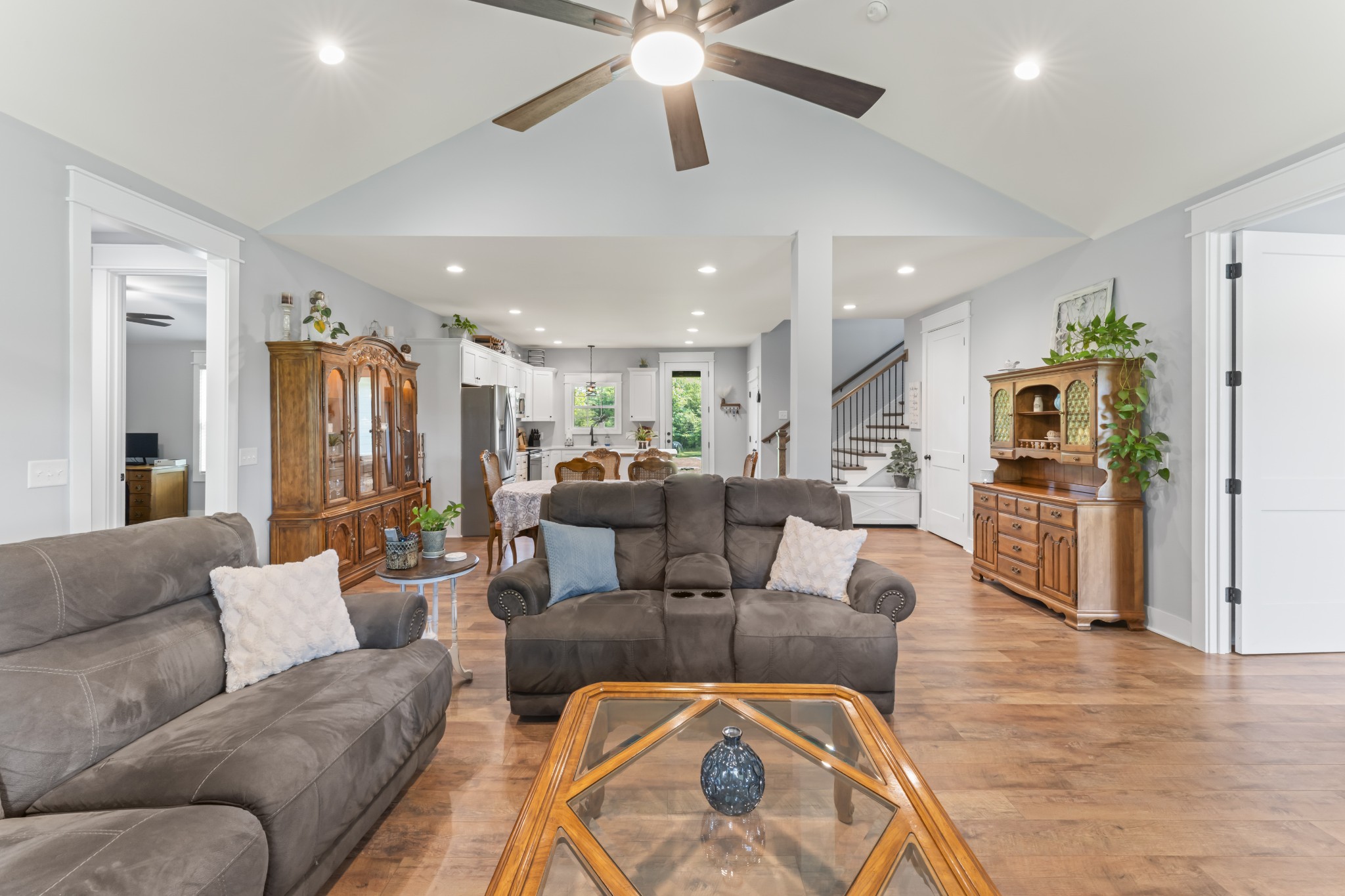 1510 Wade Brown Road Lewisburg, TN 37091 - Photo 24 of 59 a living room with furniture kitchen view and a chandelier