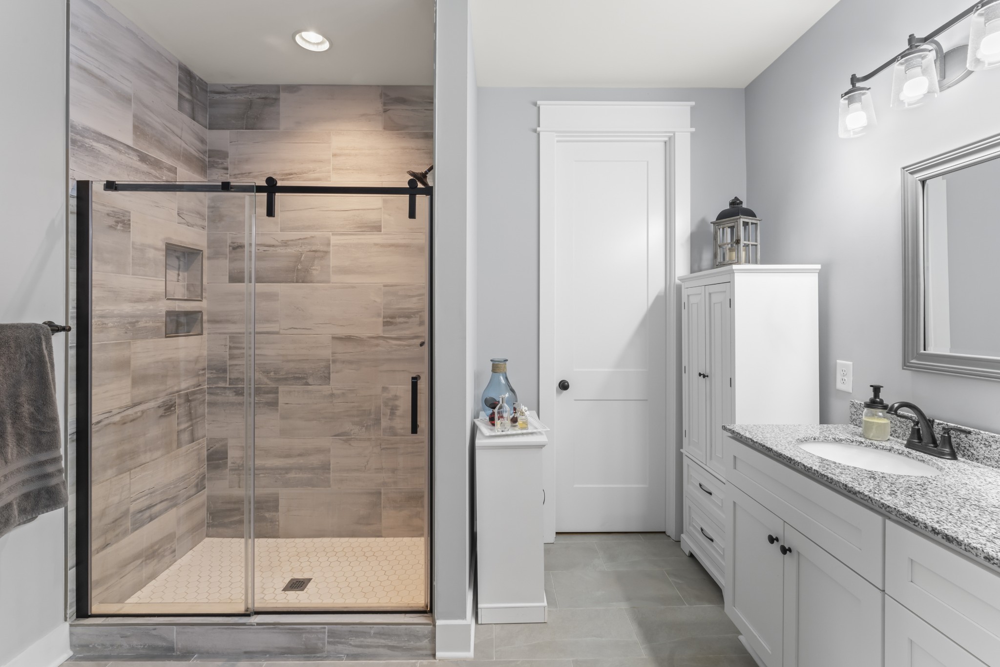 1510 Wade Brown Road Lewisburg, TN 37091 - Photo 36 of 59 a bathroom with a granite countertop sink mirror and shower