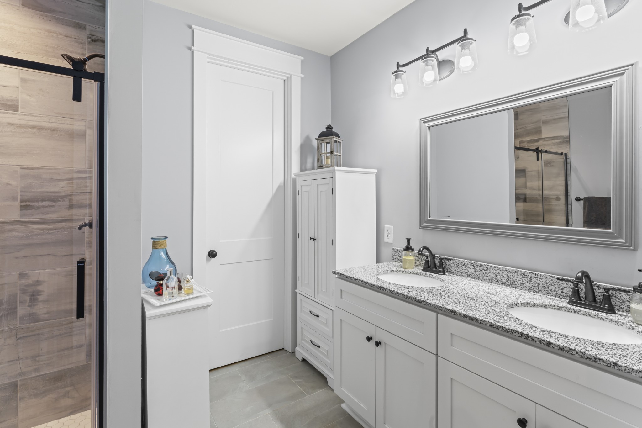 1510 Wade Brown Road Lewisburg, TN 37091 - Photo 38 of 59 a bathroom with a granite countertop sink and a mirror