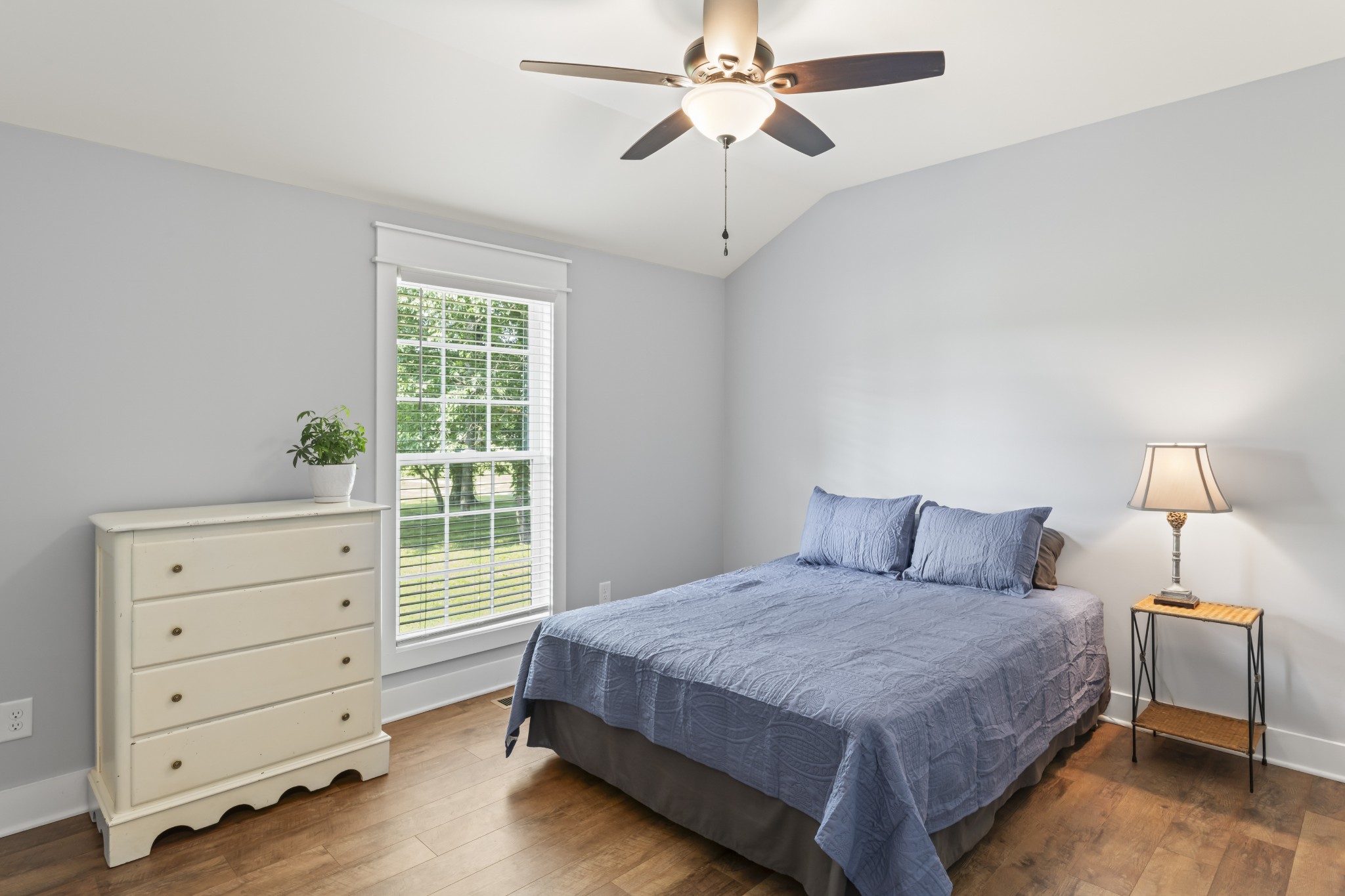 1510 Wade Brown Road Lewisburg, TN 37091 - Photo 40 of 59 a bedroom with a bed and a window dresser