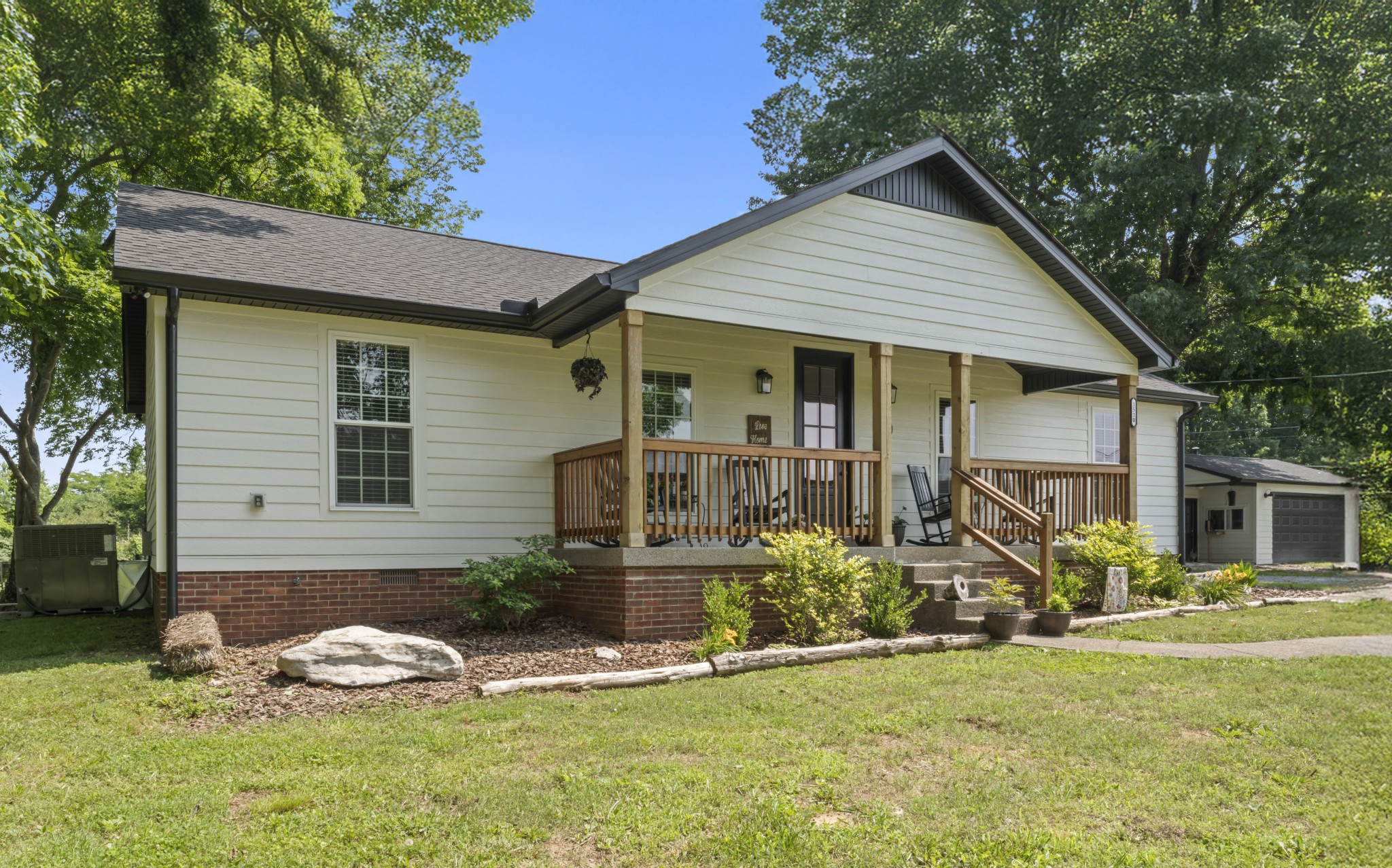 1510 Wade Brown Road Lewisburg, TN 37091 - Photo 4 of 59 a front view of house with yard outdoor seating and barbeque oven