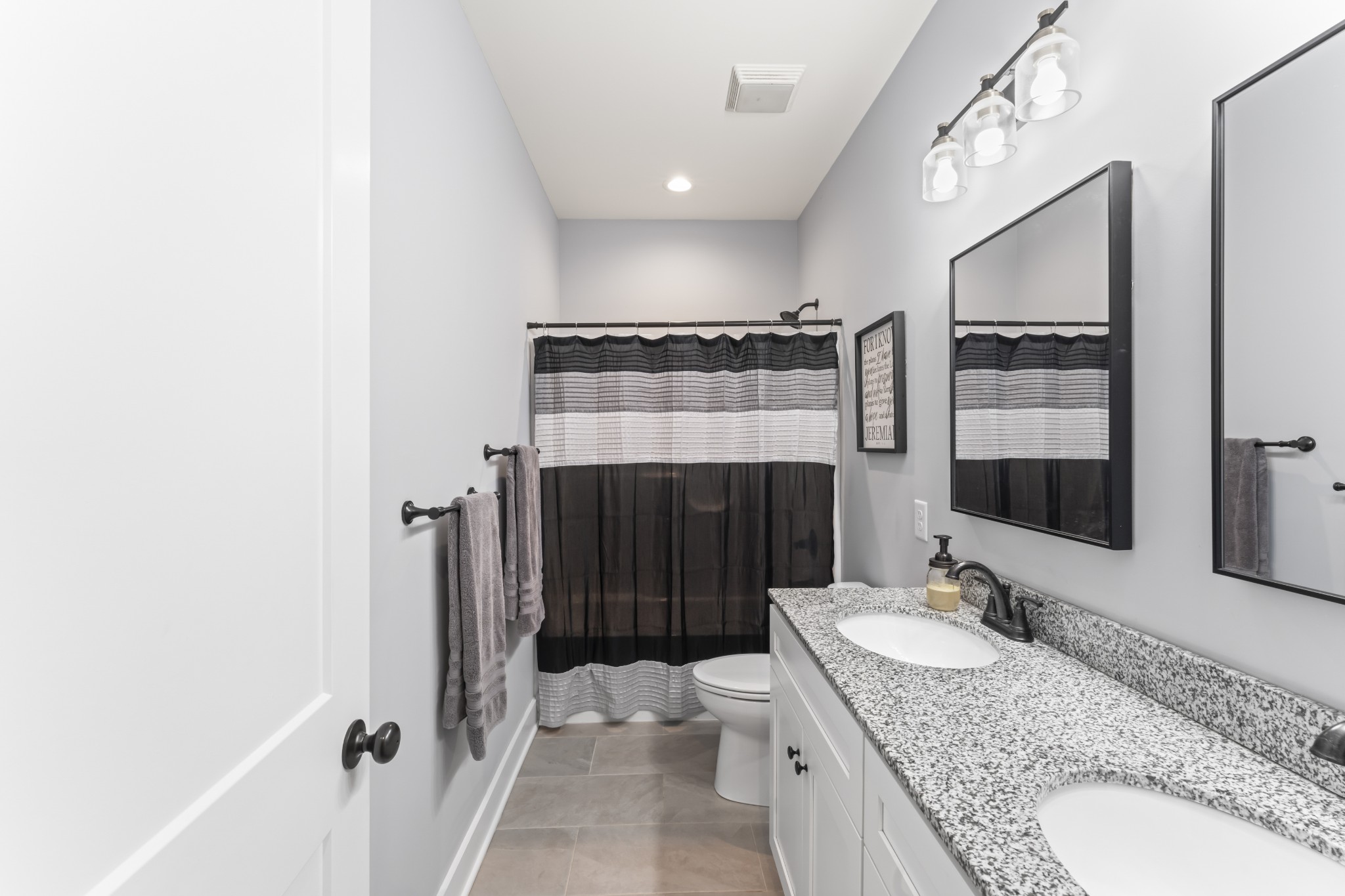 1510 Wade Brown Road Lewisburg, TN 37091 - Photo 44 of 59 a bathroom with a granite countertop sink toilet and shower