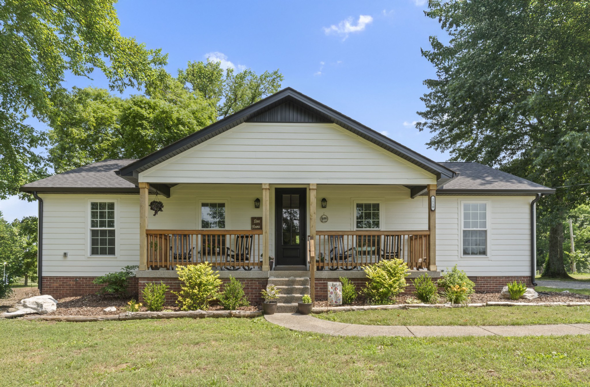 1510 Wade Brown Road Lewisburg, TN 37091 - Photo 5 of 59 front view of a house and a yard