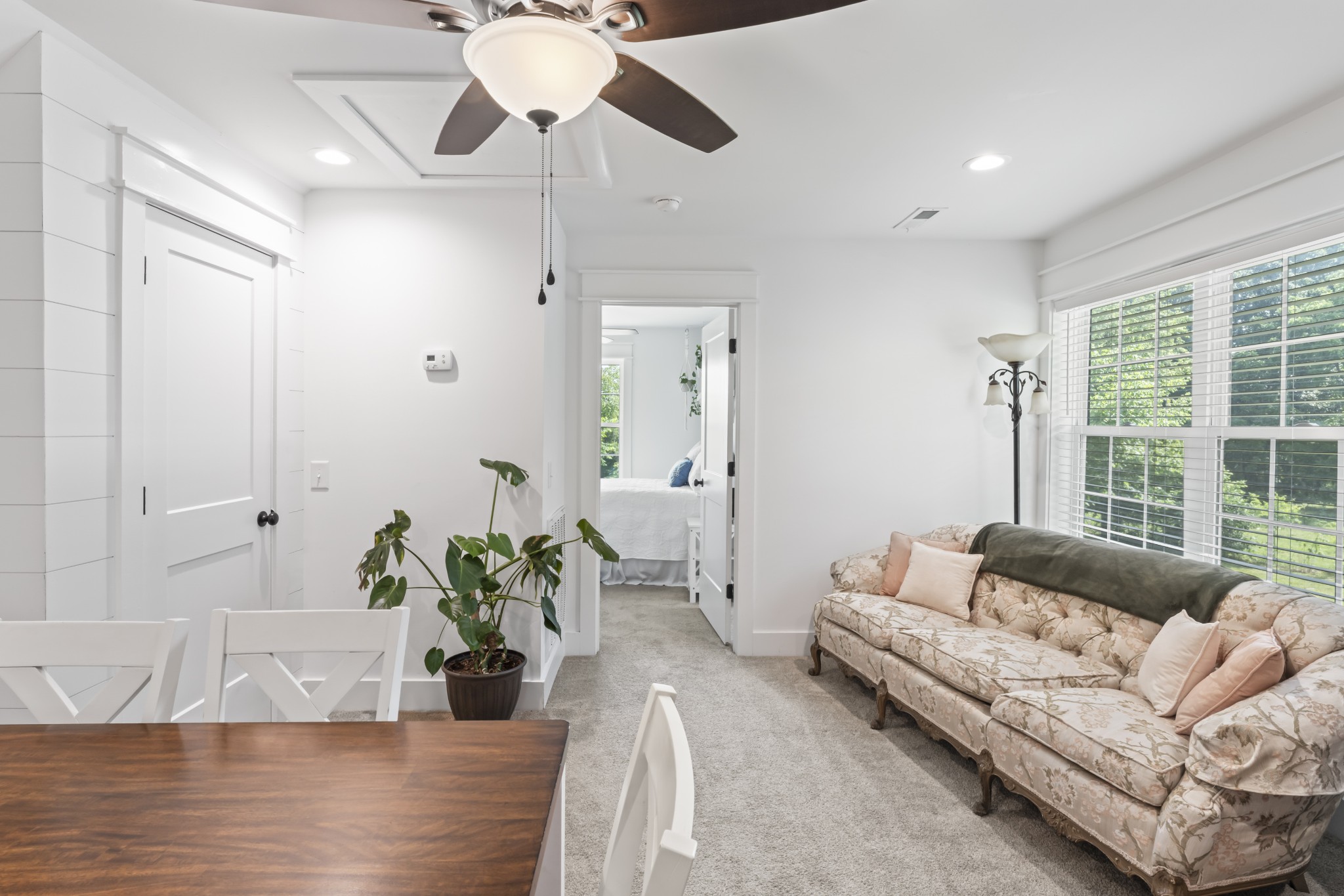 1510 Wade Brown Road Lewisburg, TN 37091 - Photo 54 of 59 a living room with furniture chandelier and a large window