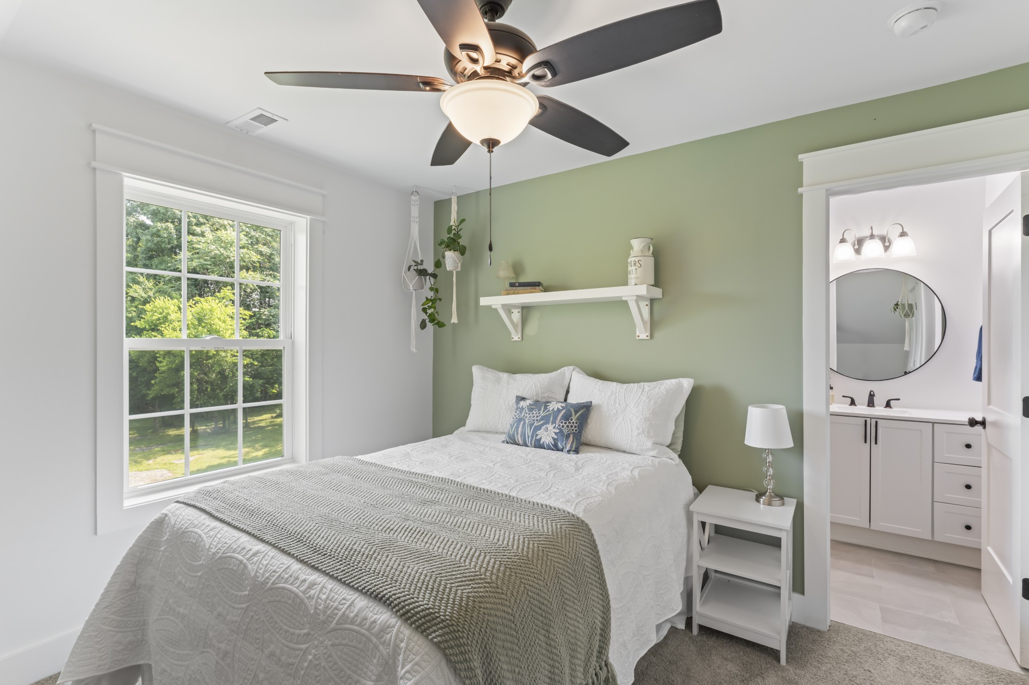 1510 Wade Brown Road Lewisburg, TN 37091 - Photo 57 of 59 a bedroom with a bed a chandelier and a window