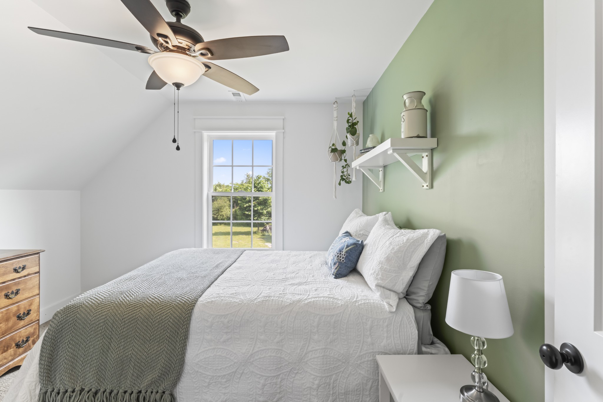 1510 Wade Brown Road Lewisburg, TN 37091 - Photo 58 of 59 a bedroom with a bed window and a chandelier