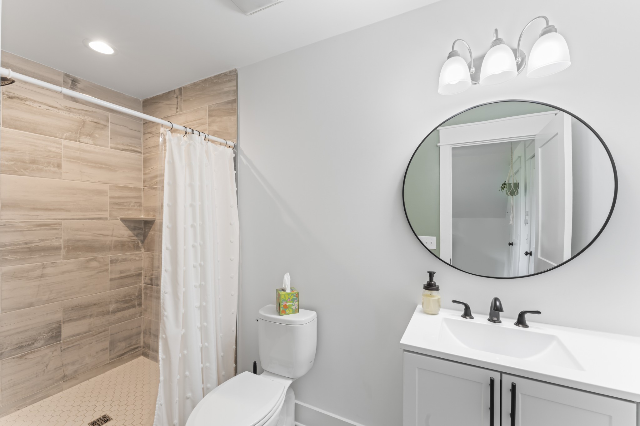 1510 Wade Brown Road Lewisburg, TN 37091 - Photo 59 of 59 a bathroom with a sink mirror and toilet