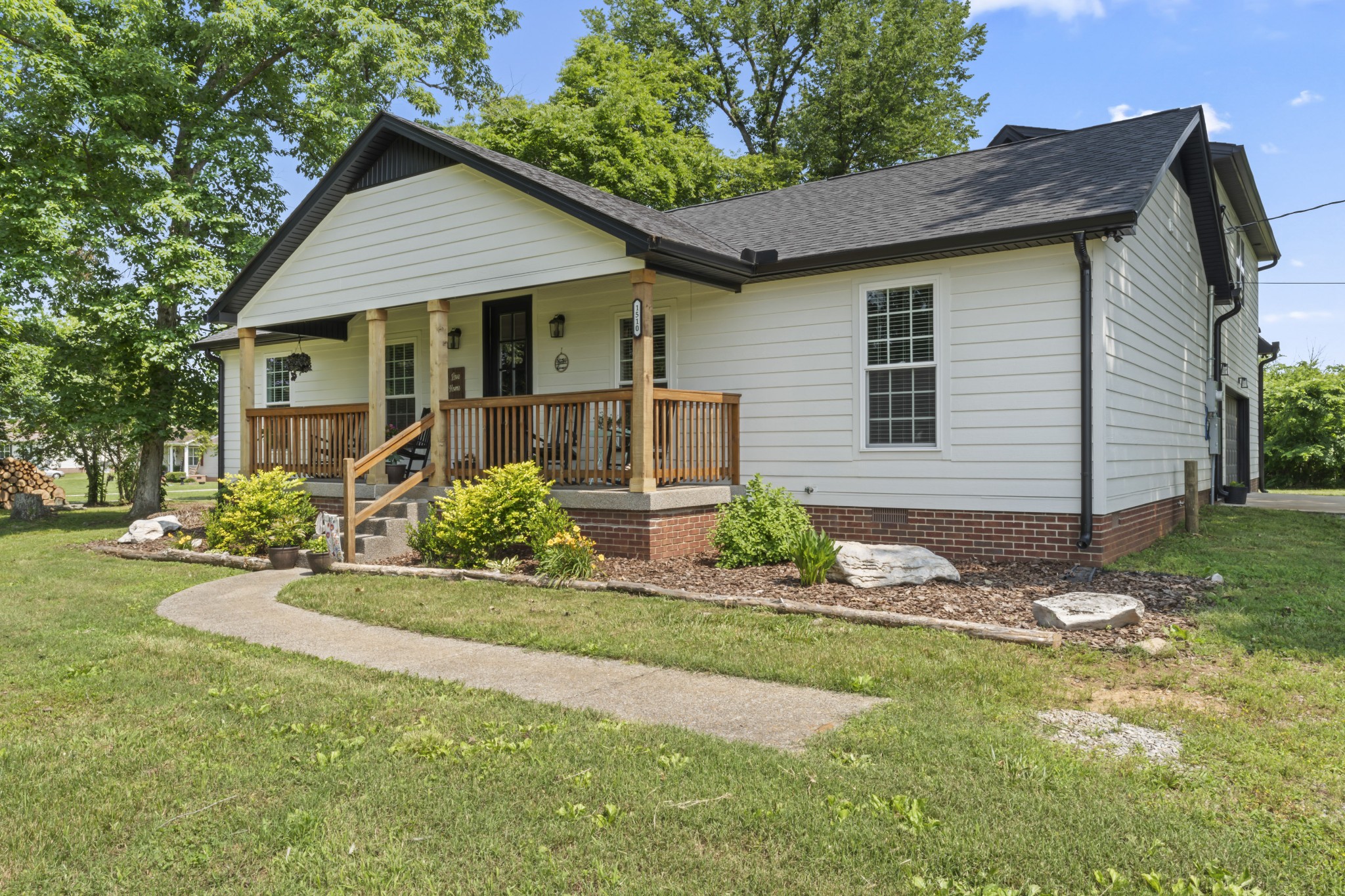 1510 Wade Brown Road Lewisburg, TN 37091 - Photo 6 of 59 a front view of a house with a yard