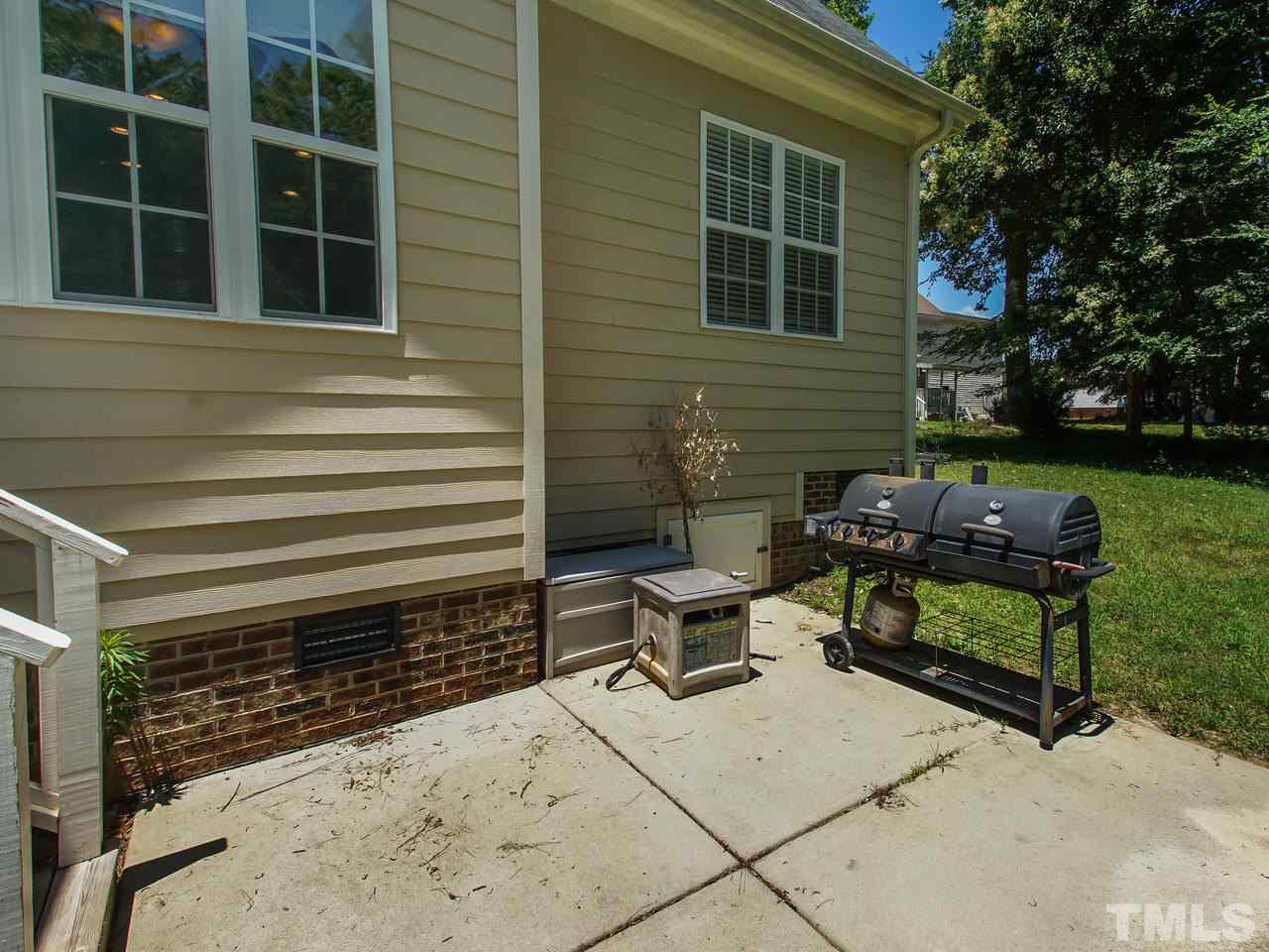 10001 Fanny Brown Road Raleigh, NC 27603 - Photo 22 of 25 a view of a backyard with chairs