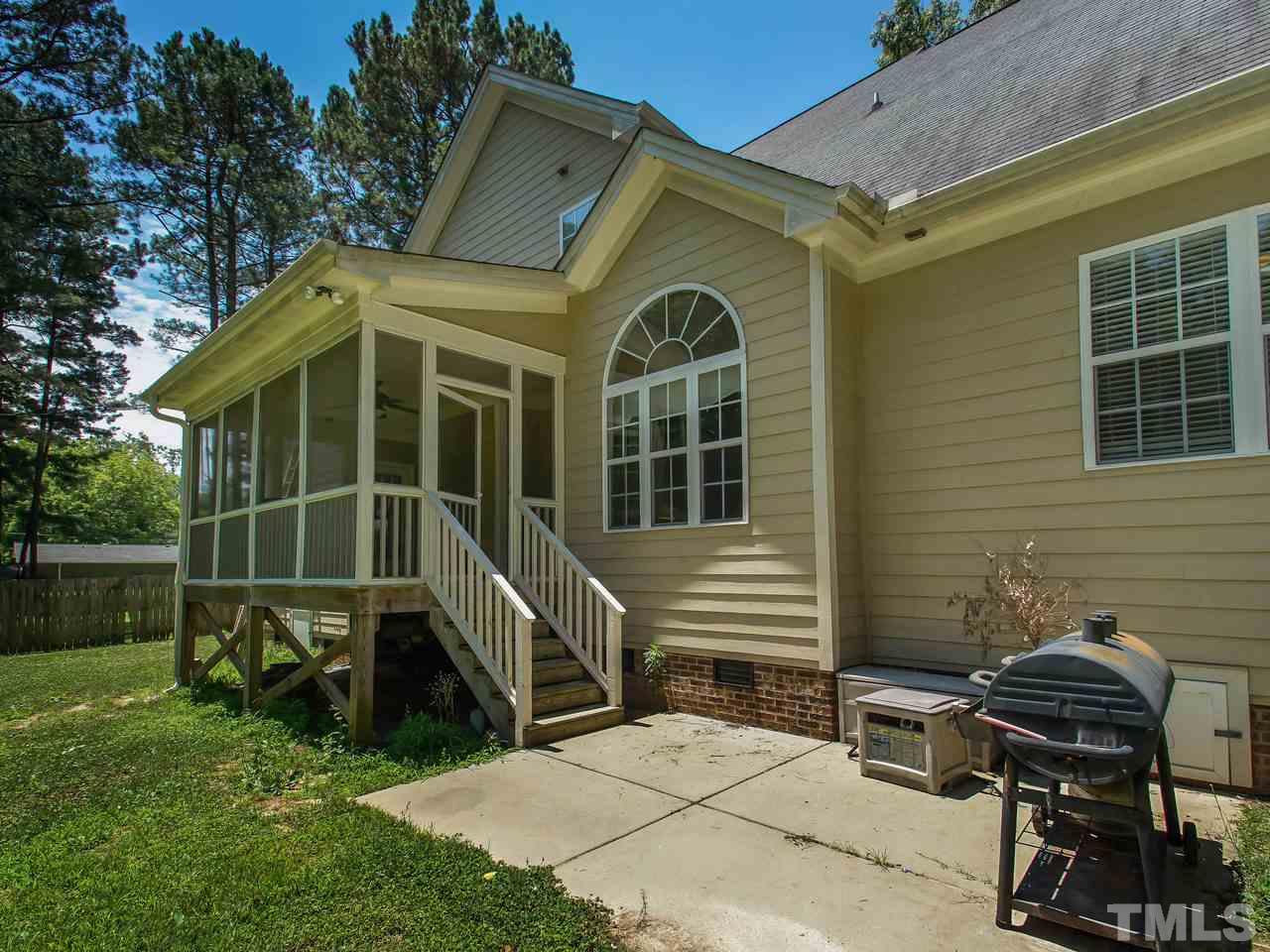 10001 Fanny Brown Road Raleigh, NC 27603 - Photo 23 of 25 a view of a house with backyard