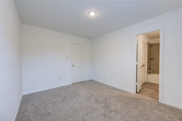 an empty room with an entryway