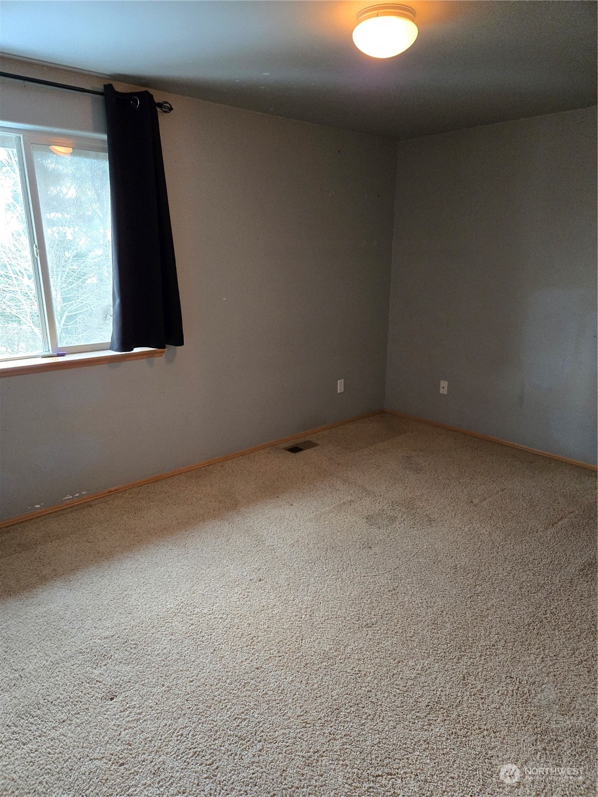 600 Northwest 3rd Court Renton, WA 98057 - Photo 11 of 28 a view of an empty room with a window