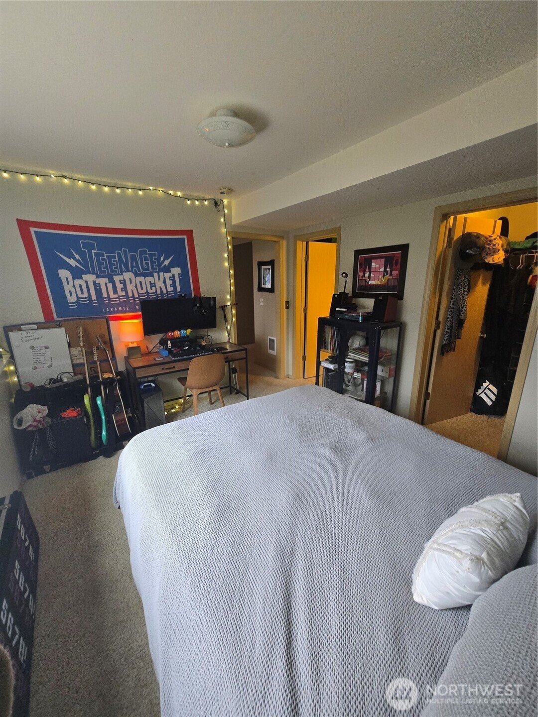 600 Northwest 3rd Court Renton, WA 98057 - Photo 23 of 28 a bed room with a bed and a television