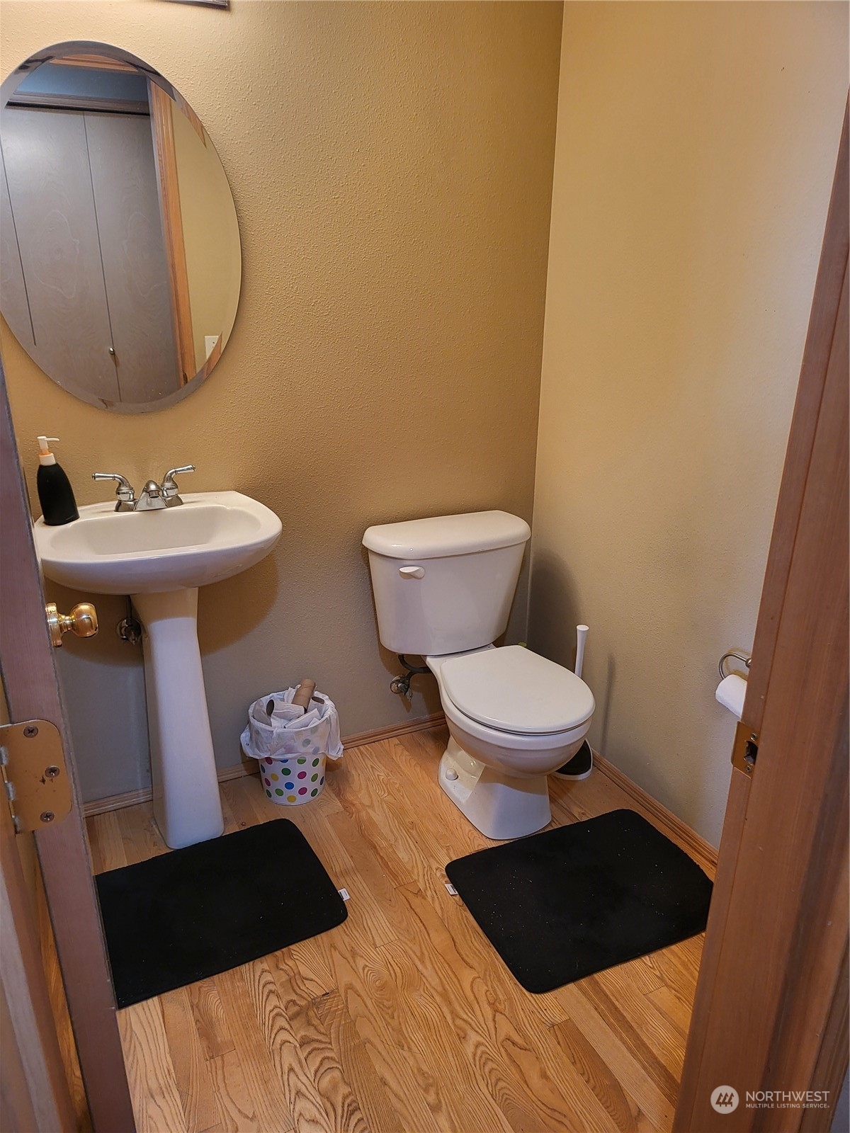 600 Northwest 3rd Court Renton, WA 98057 - Photo 8 of 28 a bathroom with a sink and a toilet