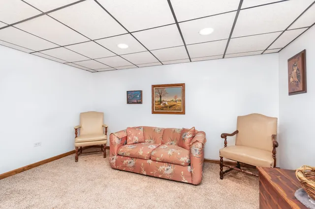 a room with lots of table and chairs