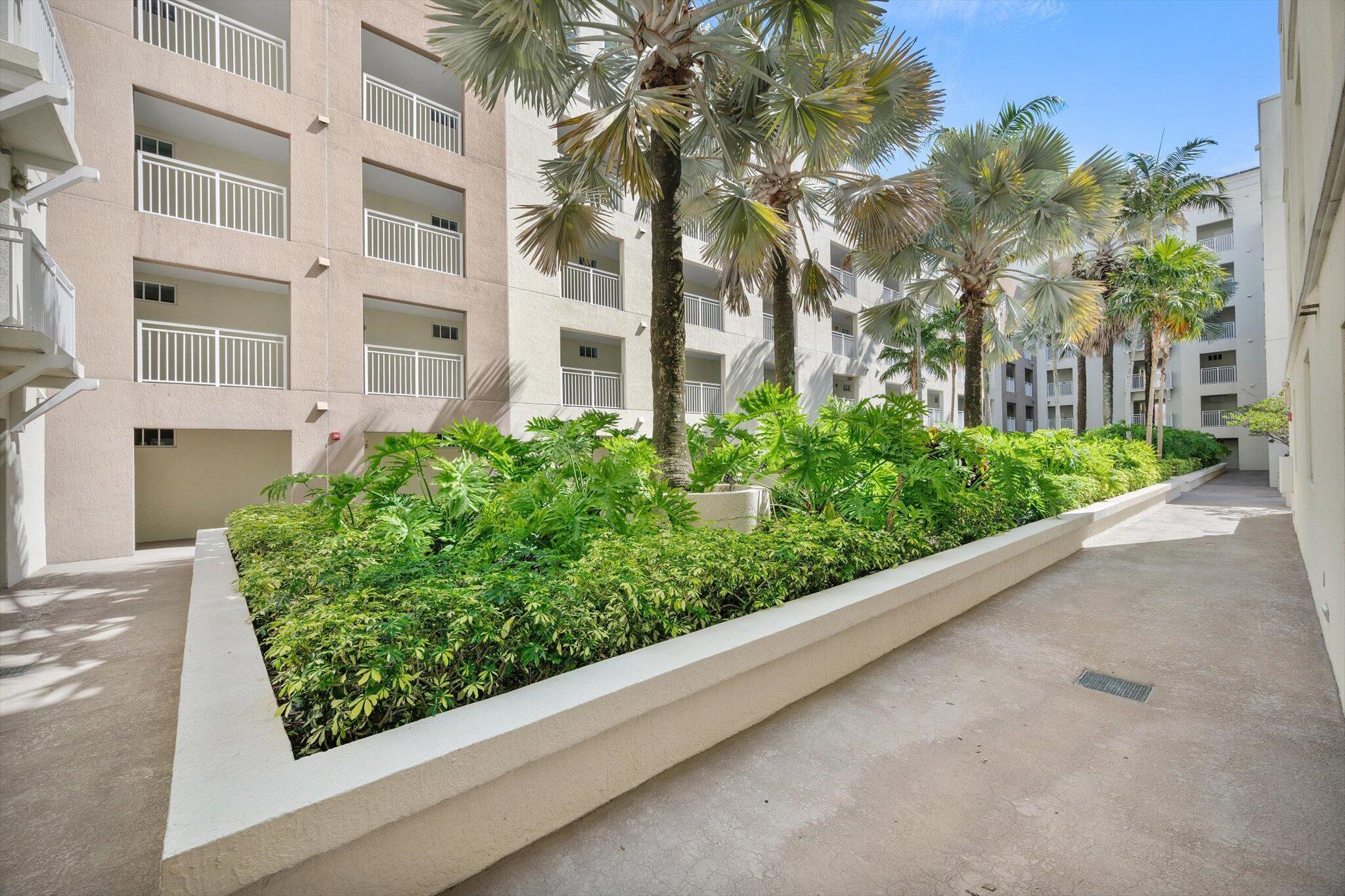 7270 Southwest 88th Street, Unit B203 Miami, FL 33156 - Photo 23 of 27 front view of a building