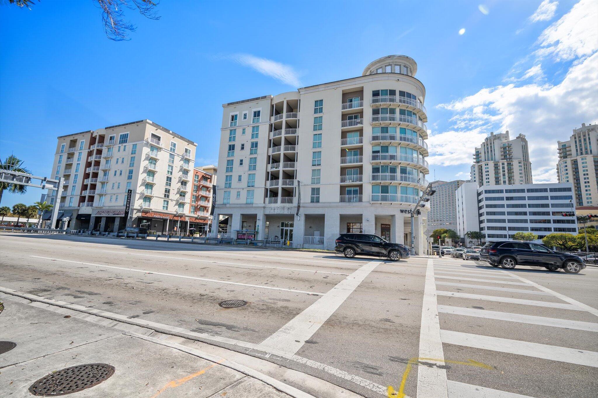 7270 Southwest 88th Street, Unit B203 Miami, FL 33156 - Photo 27 of 27 a front view of a building with street view