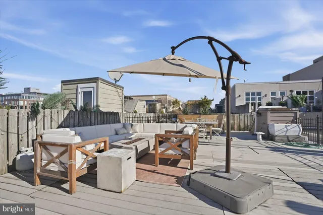 a view of a terrace with wooden floor
